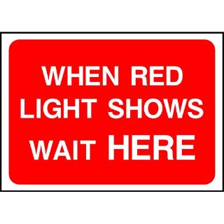 Picture of "When Red Lights Shows Wait Here" Sign 