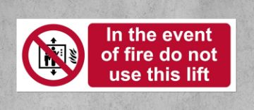 Picture of In the event of fire do not use this lift Safety sign - Self adhesive sticker 150mm x 50mm